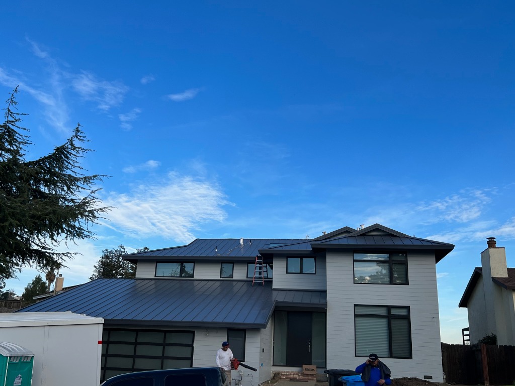 Roofing professional working on a roof